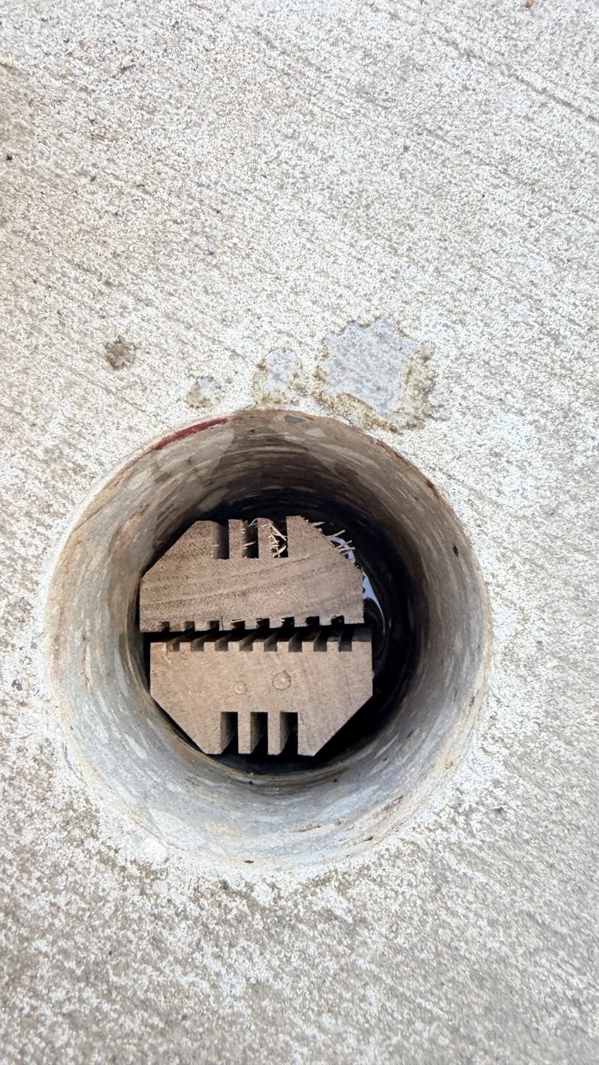 Close-up of a termite station access point